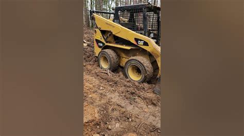 bobcat skid steer stuck in mud|skid steer loader stuck in mud.